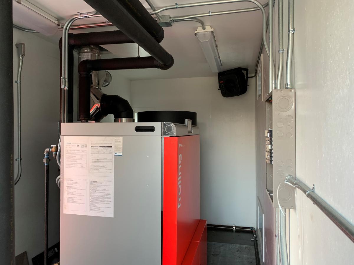 the 340 MBH biomass boiler is expected to use about 70 tons of wood pellets a year, saving the school from burning about 8,500 gallons of fuel oil each year. (Wisewood Energy photo)